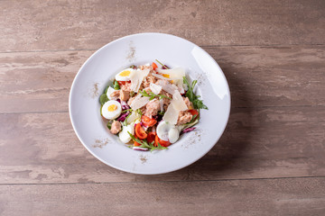 close up of fresh tasty tuna salad with eggs