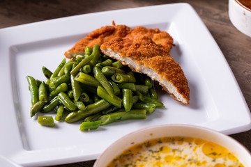 details of fresh boiled green beans with fried breast