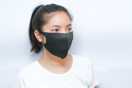 Women wearing a face mask protection against virus and dust
