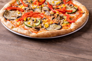 details of vegetarian pizza on a plate