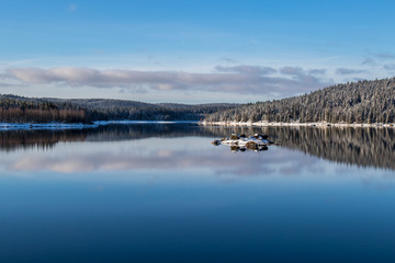 Winter landscape of water reservoir Josefuv Dul in Jizera Mountains