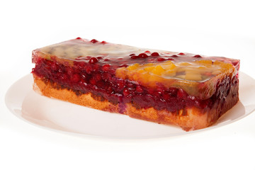 cheesecake with berries isolated on white