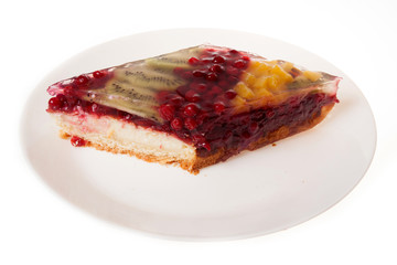 cheesecake with berries isolated on white