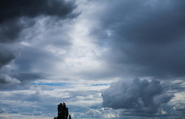 Dramatic sky with stormy clouds before thunderstorm.