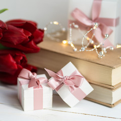 A small box with jewelry. Best gift for any holiday. Fashion trend. Charm bracelet.