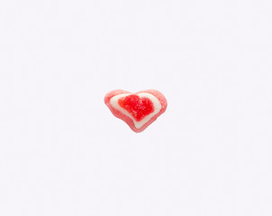 red heart candy isolated on white background