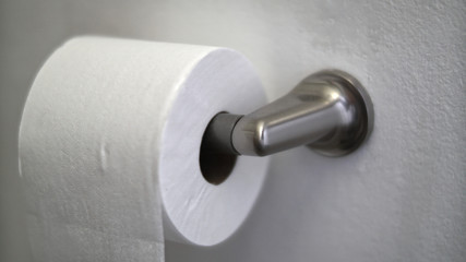 A new toiletpaper roll in a bathroom