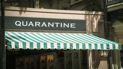 Naklejka premium Street Sign to Quarantine versus Virus