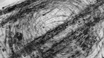 Aerial top view abstract texture and background asphalt road with car tire track skid mark on race track, Abstract texture of car drift tire track skid mark black and white, Automobile concept.