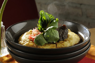 Brasato of Rump in red wine and radishes Vinaigrette with cress on creamy polenta ..