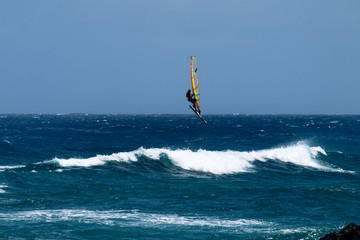 Wind surfing on the island's coast in the area of Costa Teguise