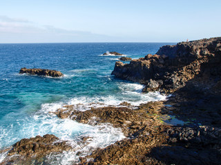 Fototapeta na wymiar rocky coast in the area of Charco de Palo