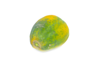 A fresh green medium sized papaya fruit isolated on a white background