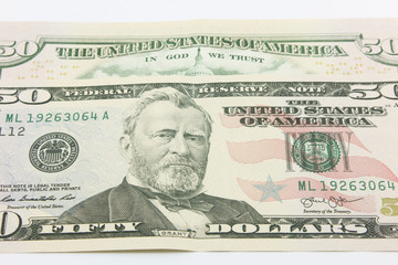Fifty dollar bills in cash on white background