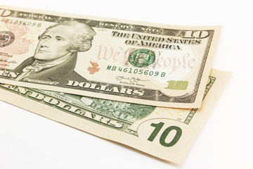 Ten dollar bills cash on white background