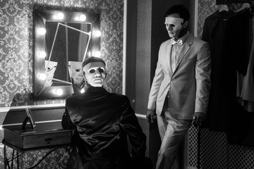 two men in masks on halloween party