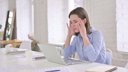 Shocked Woman Reacting to Failure in Modern Office