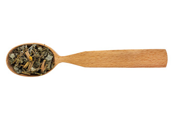 Dried Chelidonium in a wooden spoon on a white background. Phytotherapy and disease prevention. Herbal collection for medicinal tinctures. Herbal tea in folk medicine. The view from the top