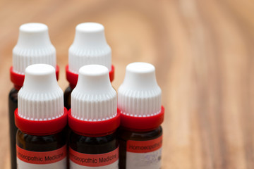 selective focus of homeopathic medicine bottle.world homeopathy day. 