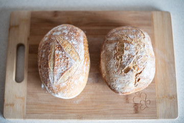 Sourdough bread is made by the fermentation of dough using naturally occurring lactobacilli and yeast. Sourdough bread has a more sour taste and better inherent keeping qualities