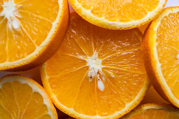 Background with citrus fruit of orange slices. Close-up. Studio photography.
