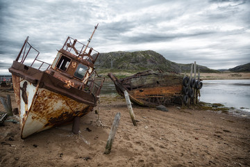 Old rusty fishing boats close up
