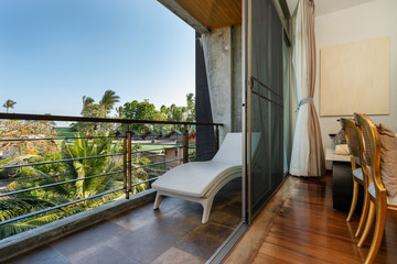 Outdoor seat on balcony with a view in pool villa, house, home, condo and apartment