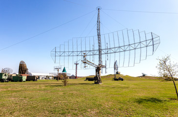 Old soviet military radar station against the blue sky