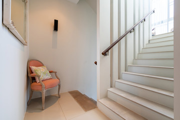 White staircase and chair in pool villa, house, home, condo and apartment