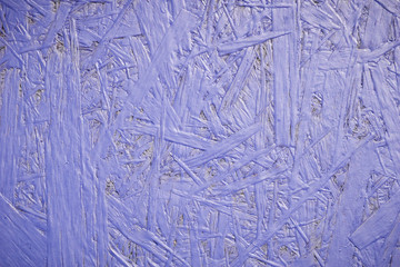 Violet or lilac painted oriented strand board (OSB) background