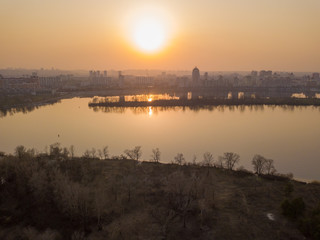 Sunset over the Dnieper River in Kiev. Aerial drone view.