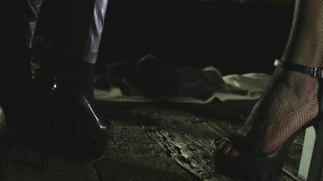 The legs of a prostitute at night close up. Night ladies