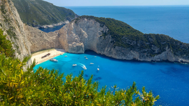 Navagio bay in greece Zakyntos. Beautiful greek bay and beach landscape with an old shipwreck on sand, top view