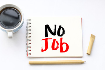 NO JOB. Word no job written on a notepad. Economic crisis concept