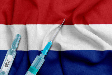 COVID-19 vaccine illustration with the Netherlands flag for creating posters, banners or news...