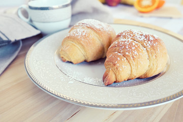 prepare tasty croissants for breakfast