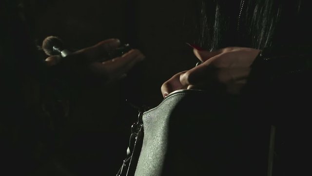 Prostitutes makeup on the street at night. Night ladies