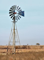 A Windmill In A Pasture In South Central Oklahoma.