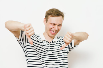 man showing a thumb down gesture