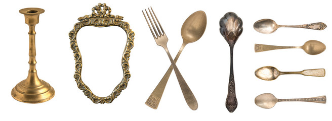 Beautiful old silver spoons isolated on white. Retro silverware.