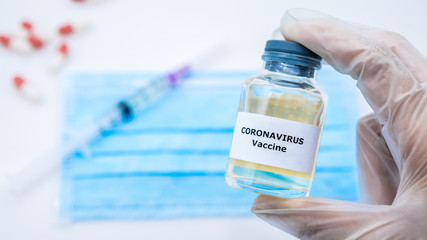 Doctor holding sample for Covid19 vaccination. Preventive medication Coronavirus