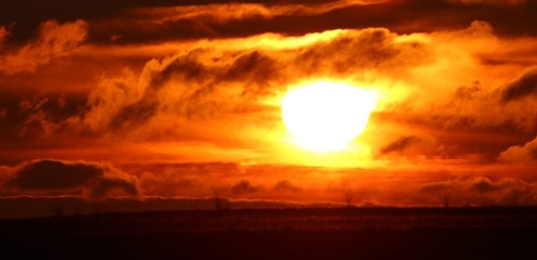 A Dramatic Sunrise Behind A Cloud Bank In South Central Oklahoma