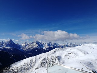 winter landscape with mountains and blue sky