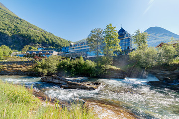 GEIRANGER, NORWAY - 2016 JUNE 14. Hotel Union in Geiranger with river in the front