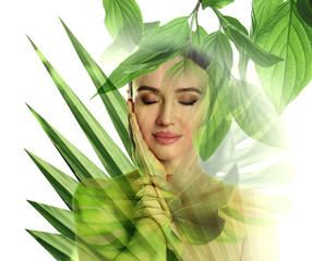 Naklejka premium Beautiful woman and tropical leaves on white background. Double exposure