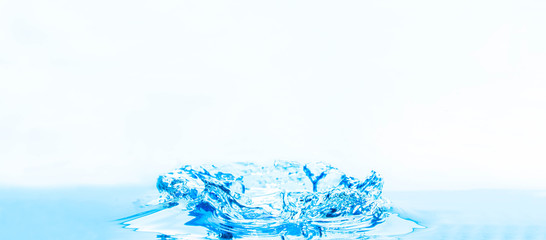 Blue water splashes on a white background