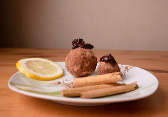 Baked potatoes for Breakfast prepared at home by hand with chocolate and sprinkled with cocoa