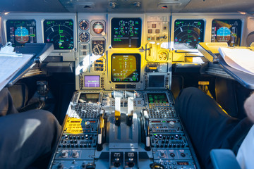 Cockpit view of an airplane in flight - obrazy, fototapety, plakaty