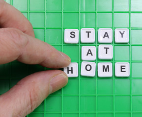STAY AT HOME text during quarantine made with the letters of a w
