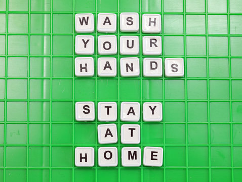 text Wash your hands and STAY HOME during the quarantine made wi - Powered by Adobe